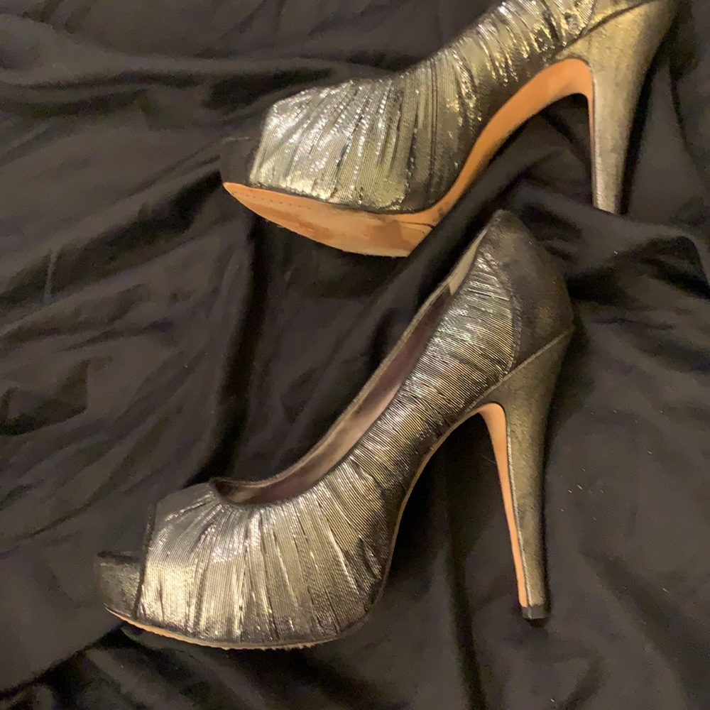 Pewter and black platform pumps